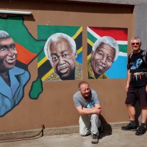 African politicians on the wall - Julius Nyerere (center) and Nelson Mandela (right)
